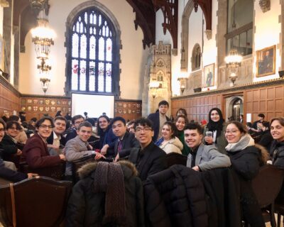 DCMUN delegates attending the 2023 N.A.M.U.N. closing ceremonies at the Great Hall in Hart House, University of Toronto.